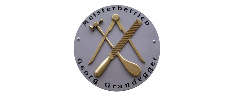 historisches Logo des Meisterbetriebes Grandegger